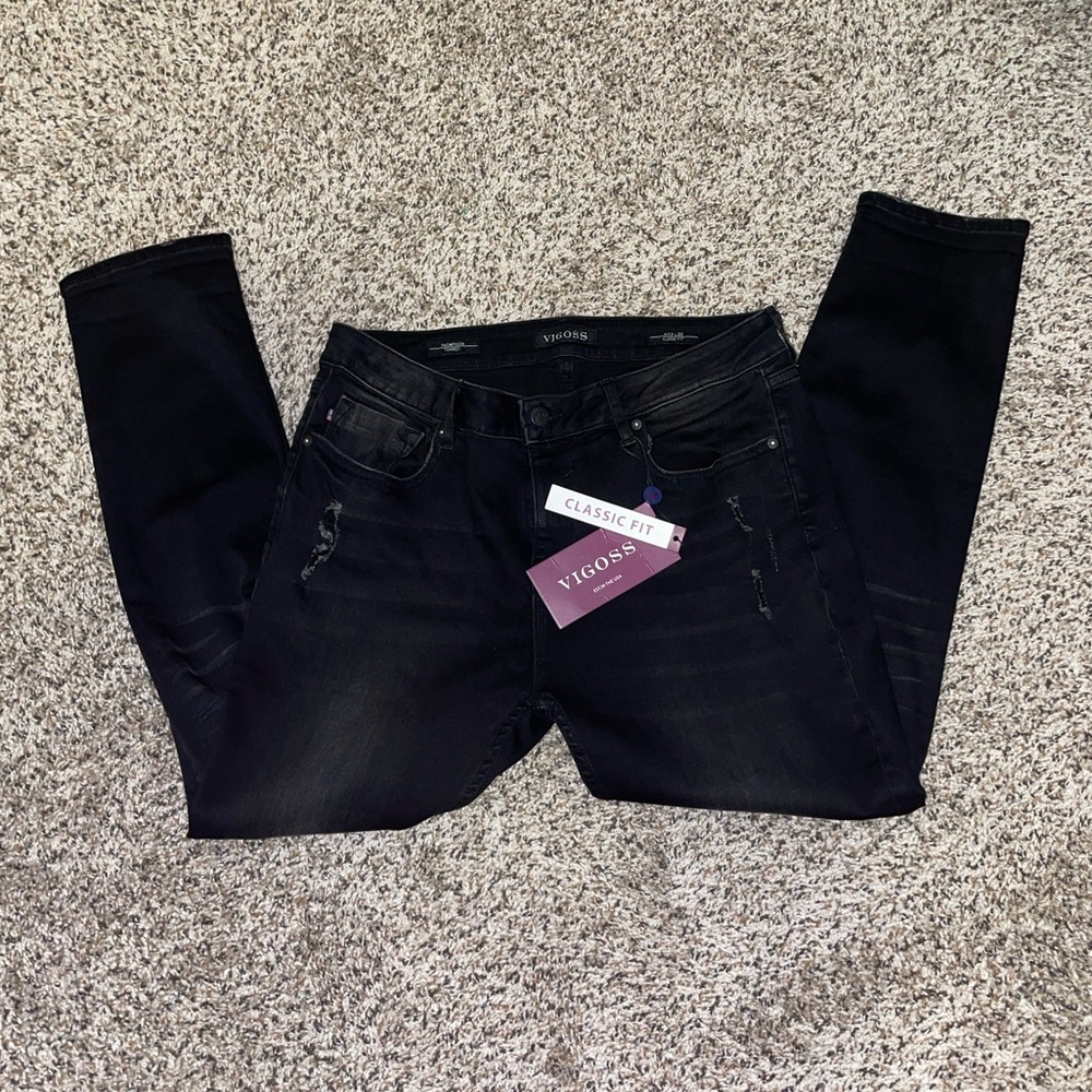 Vigoss size 14 black jeans with very little rips.
